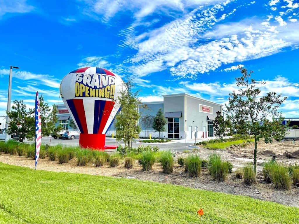 Grand opening promotional products, balloon rentals, and cold air inflatables in Florida.