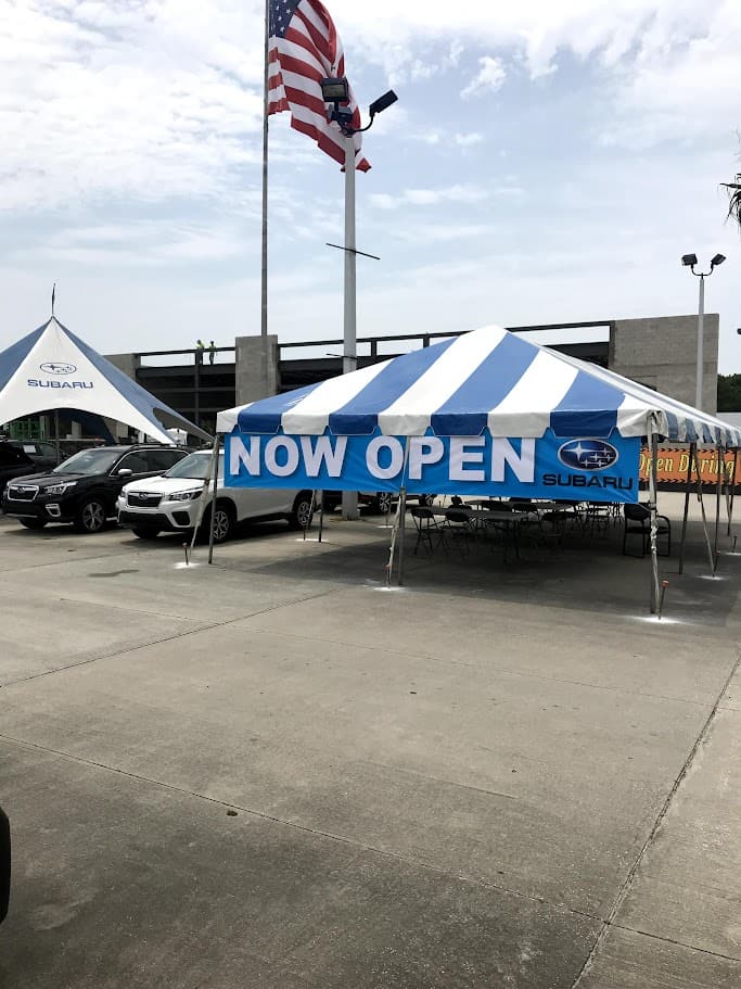 Large tents for outdoor events with custom banners - Giant Promotions